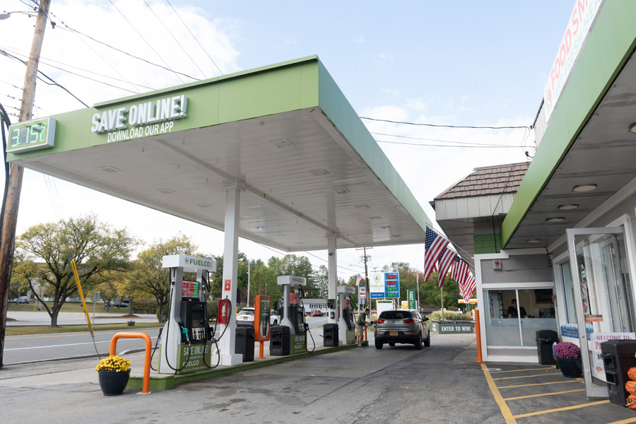 Fuelco.com gas station with a car filling up their gas tank.